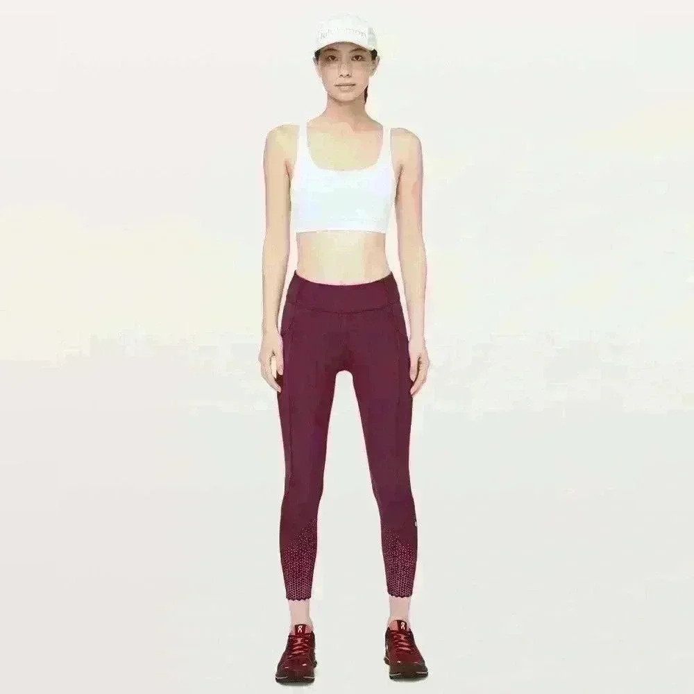 Lululemon Tight Stuff Tight II 25" size 4 like new condition 
Deep Ruby